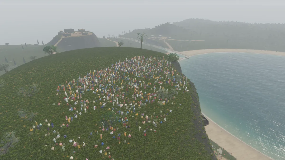 A crowd gathered on a green hilltop above the Sea of Galilee
